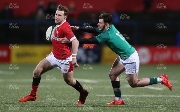 070220 - Ireland U20s v Wales U20s - U20s 6 Nations Championship - Ioan Lloyd of Wales is tackled by Andrew Smith of Ireland