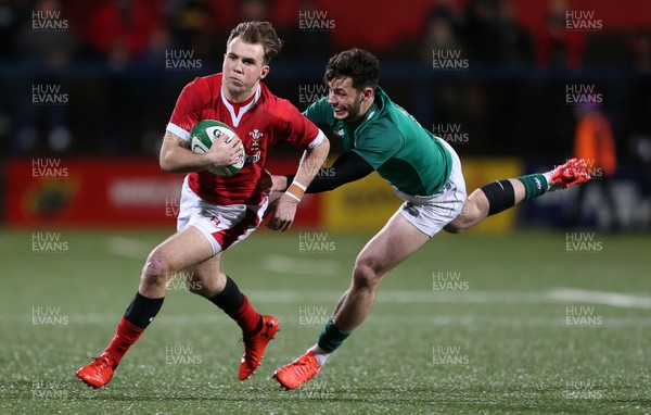 070220 - Ireland U20s v Wales U20s - U20s 6 Nations Championship - Ioan Lloyd of Wales is tackled by Andrew Smith of Ireland