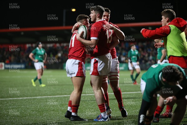 070220 - Ireland U20s v Wales U20s - U20s 6 Nations Championship - Osian Knott of Wales celebrates scoring a try with team mates