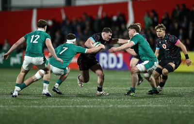 070326 - Ireland U20s v Wales U20s - U20s Six Nations Championship - Caio James of Wales is tackled by Ben Blaney of Ireland 