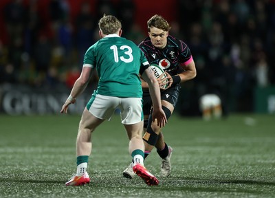 070326 - Ireland U20s v Wales U20s - U20s Six Nations Championship - Dom Kossuth of Wales is tackled by Rob Carney of Ireland 