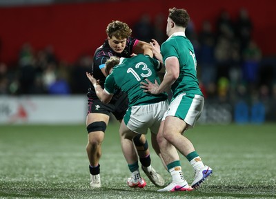 070326 - Ireland U20s v Wales U20s - U20s Six Nations Championship - Dom Kossuth of Wales is tackled by Rob Carney of Ireland 