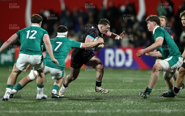 070326 - Ireland U20s v Wales U20s - U20s Six Nations Championship - Caio James of Wales is tackled by Ben Blaney of Ireland 