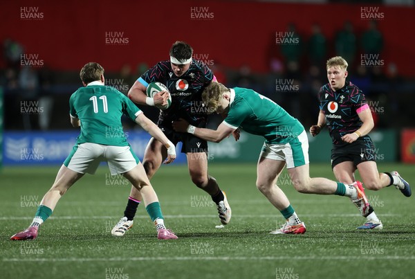 070326 - Ireland U20s v Wales U20s - U20s Six Nations Championship - Tom Howe of Wales is tackled by Rob Carney of Ireland 