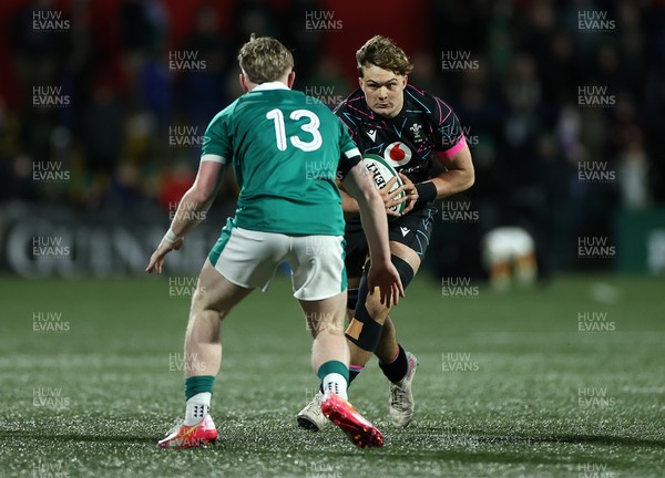 070326 - Ireland U20s v Wales U20s - U20s Six Nations Championship - Dom Kossuth of Wales is tackled by Rob Carney of Ireland 