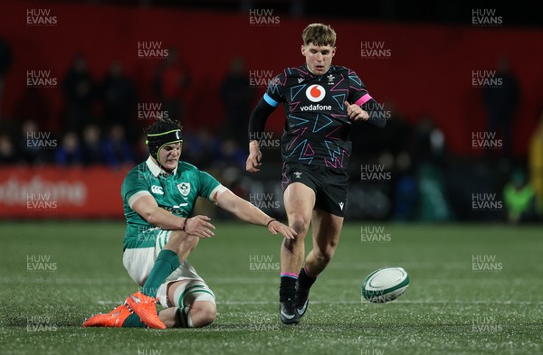 070326 - Ireland U20s v Wales U20s - U20s Six Nations Championship - Steffan Emanuel of Wales is challenged by Josh Neill of Ireland 