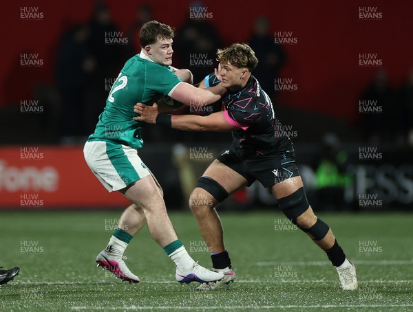 070326 - Ireland U20s v Wales U20s - U20s Six Nations Championship - James O'Leary of Ireland is tackled by Dom Kossuth of Wales 