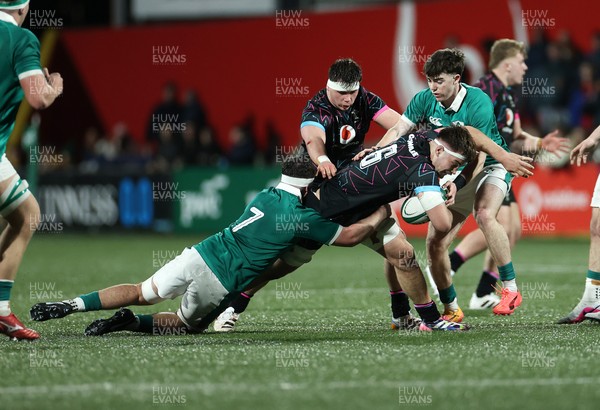 070326 - Ireland U20s v Wales U20s - U20s Six Nations Championship - Deian Gwynne of Wales is tackled by Ben Blaney of Ireland 
