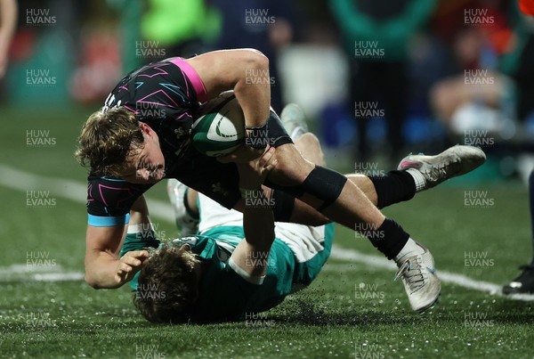 070326 - Ireland U20s v Wales U20s - U20s Six Nations Championship - Dom Kossuth of Wales is tackled by Christopher Barrett of Ireland e