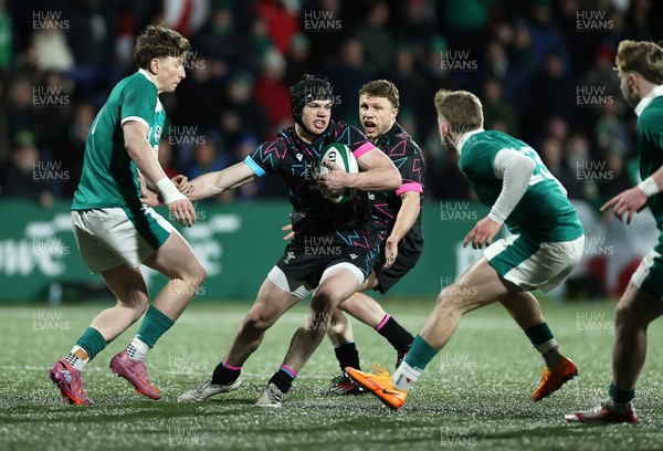 070326 - Ireland U20s v Wales U20s - U20s Six Nations Championship - Rhys Cummings of Wales is tackled by Johnny O�Sullivan of Ireland 