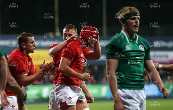 230218 - Ireland U20s v Wales U20s - Natwest 6 Nations - James Botham of Wales celebrates scoring a try with Tommy Reffell