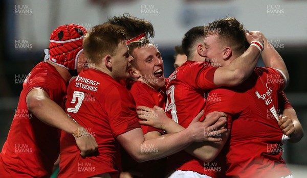230218 - Ireland U20s v Wales U20s - Natwest 6 Nations - Tommy Reffell of Wales celebrates scoring a try with team mates