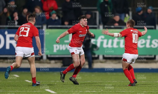 230218 - Ireland U20s v Wales U20s - Natwest 6 Nations - Callum Carson of Wales celebrates with Ben Jones at full time
