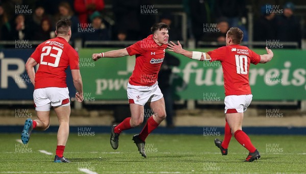 230218 - Ireland U20s v Wales U20s - Natwest 6 Nations - Callum Carson of Wales celebrates with Ben Jones at full time