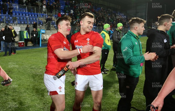 230218 - Ireland U20s v Wales U20s - Natwest 6 Nations - Callum Carson and Cai Evans of Wales celebrate at full time