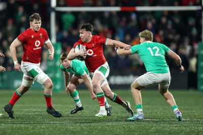 230224 - Ireland U20s v Wales U20s - U20s 6 Nations Championship - Harri Ackerman of Wales is challenged by Hugh Gavin of Ireland 