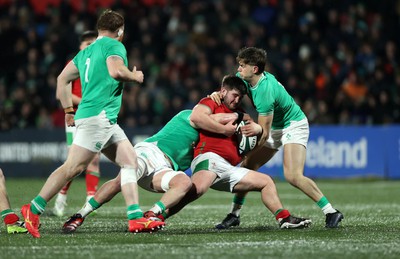 230224 - Ireland U20s v Wales U20s - U20s 6 Nations Championship - Harry Thomas of Wales is Bryn Ward of Ireland 