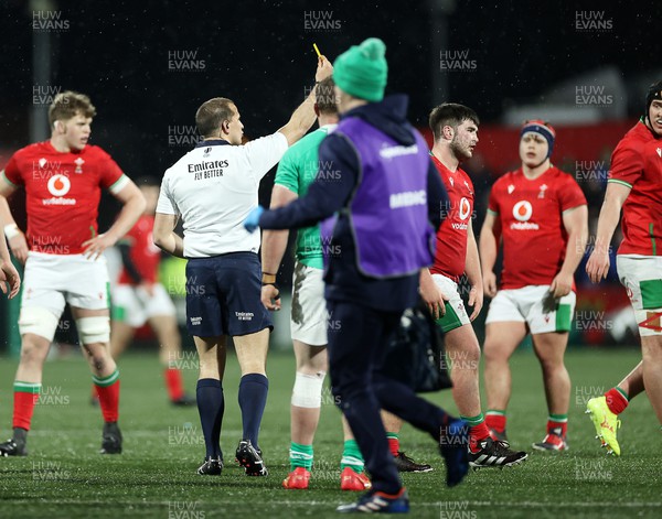 230224 - Ireland U20s v Wales U20s - U20s 6 Nations Championship - Harry Thomas of Wales is given a yellow card