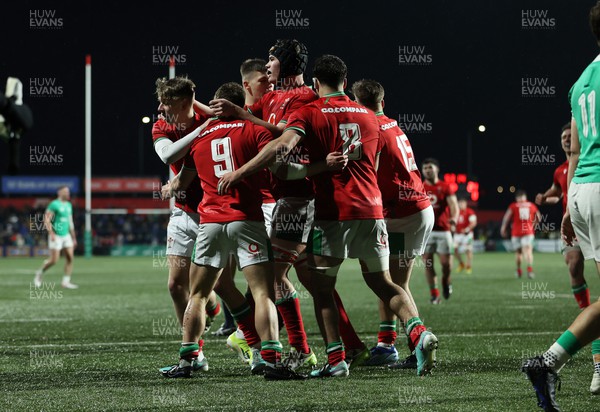 230224 - Ireland U20s v Wales U20s - U20s 6 Nations Championship - Ieuan Davies of Wales celebrates scoring a try with team mates