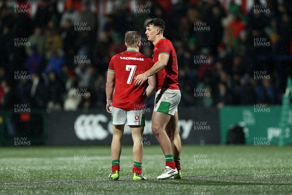 230224 - Ireland U20s v Wales U20s - U20s 6 Nations Championship - Dejected Harry Beddall and Louie Hennessey of Wales at full time