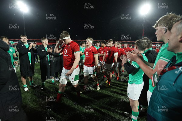 230224 - Ireland U20s v Wales U20s - U20s 6 Nations Championship - Wales walk through the players tunnel at full time