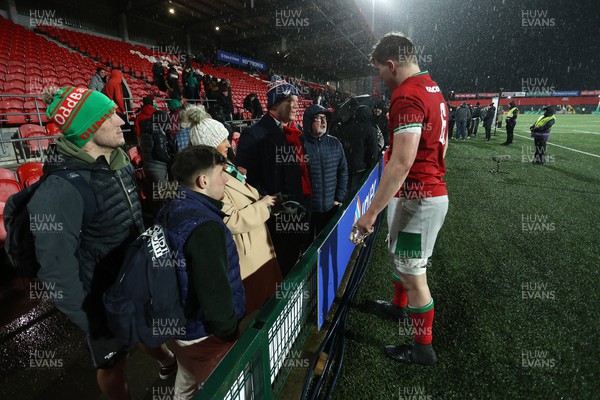 230224 - Ireland U20s v Wales U20s - U20s 6 Nations Championship - Osian Thomas of Wales with family at full time