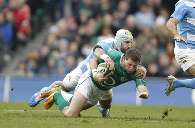 241112 Ireland v Argentina - Autumn Internationals 2012 - Craig Gilroy of Ireland is tackled by Juan Manuel Leguizamon of Argentina 