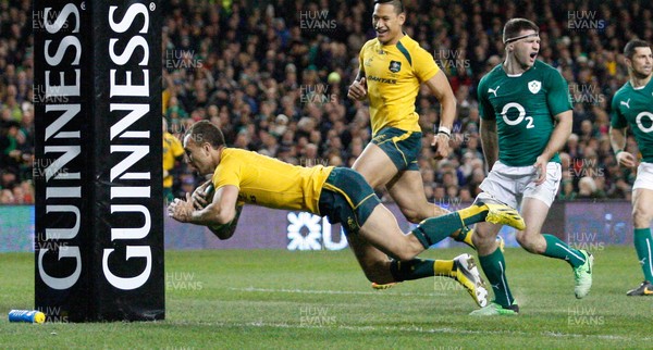 16/11/13 - Ireland v Australia - Guiness SeriesQuade Cooper breaks through to score the third try for Australia (c) Huw Evans Picture Agency