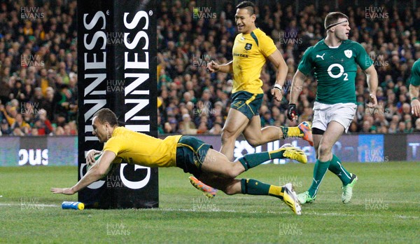 16/11/13 - Ireland v Australia - Guiness SeriesQuade Cooper breaks through to score the third try for Australia (c) Huw Evans Picture Agency