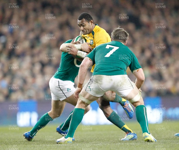 16/11/13 - Ireland v Australia - Guiness SeriesTevita Kuridrani of Austraia is tackled by Ian Madigan and Sean O'Brien of Ireland (c) Huw Evans Picture Agency