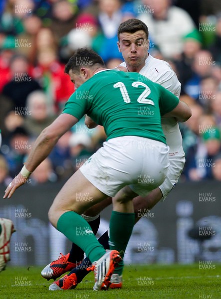 010315 - Ireland v England - RBS 6 Nations - George Ford of England is tackled by Robbie Henshaw of Ireland