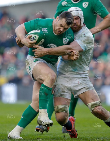 010315 - Ireland v England - RBS 6 Nations - Cian Healy of Ireland is tackled by Dave Attwood of England