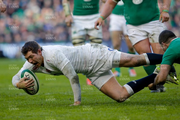 010315 - Ireland v England - RBS 6 Nations - Alex Goode of England is tackled by Rob Kearney of Ireland