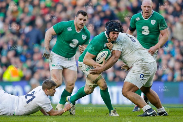 010315 - Ireland v England - RBS 6 Nations - Tommy O'Donnell of Ireland is tackled by Richard Wigglesworth and Billy Vunipola of England