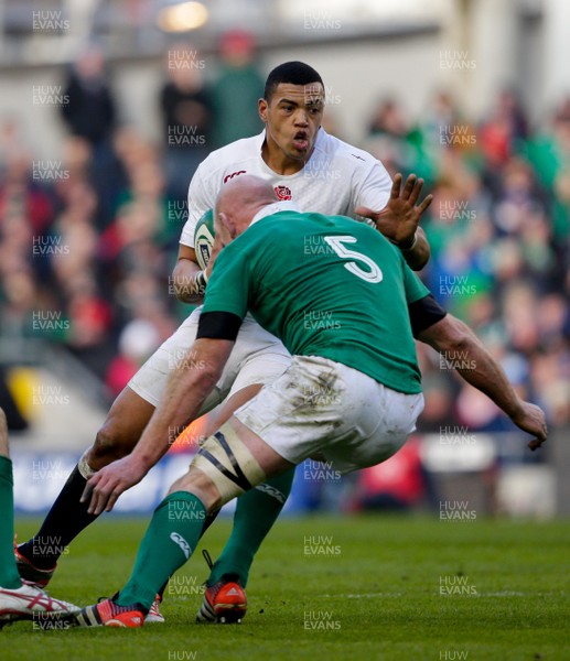 010315 - Ireland v England - RBS 6 Nations - Luther Burrell of England is tackled by Paul O'Connell of Ireland