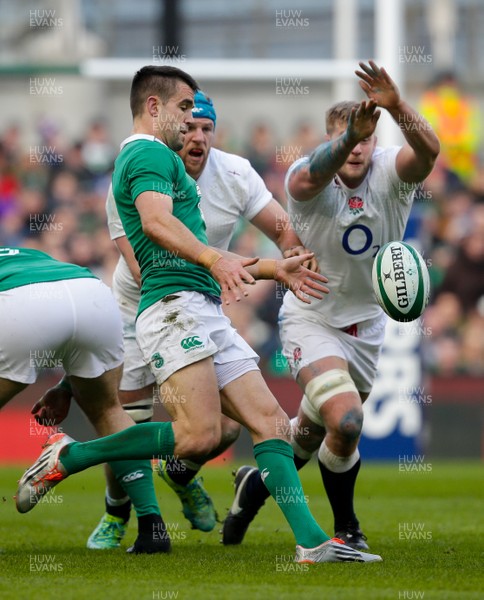 010315 - Ireland v England - RBS 6 Nations - Conor Murray of Ireland kicks as James Haskell and George Kruis try to charge down