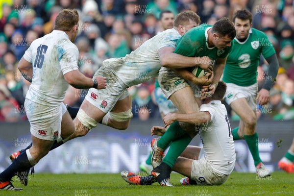 010315 - Ireland v England - RBS 6 Nations - Robbie Henshaw of Ireland is tackled by George Kruis and George Ford