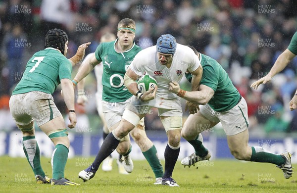 100213 - Ireland v England, 2013 RBS 6 Nations - James Haskell of England tackled by Ireland's Sean O'Brien and Cian Healy  