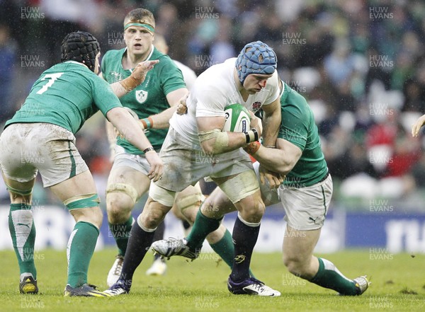 100213 - Ireland v England, 2013 RBS 6 Nations - James Haskell of England tackled by Ireland's Sean O'Brien and Cian Healy  