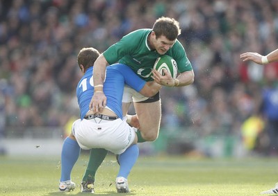 250212 Ireland v Italy - RBS Six Nations - Gordon D'Arcy of Ireland is tackled by Tobias Botes of Italy