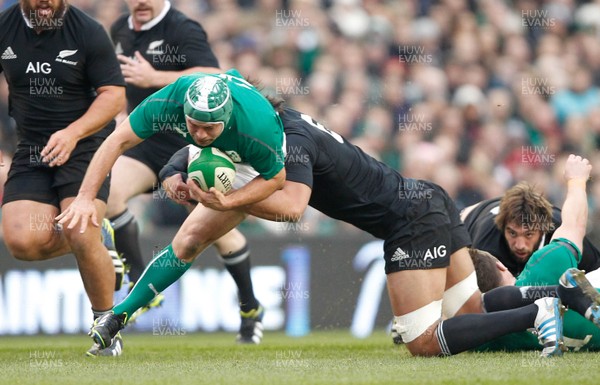 241113 - Guinness Series - Ireland v New Zealand  Rory Best of Ireland tackled by  Steven Luatua of New Zealand  (c) Huw Evans Agency