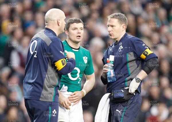 241113 - Guinness Series - Ireland v New Zealand  Brian O'Driscoll of Ireland receives attention from Dr Eanna Flavey (c) Huw Evans Agency