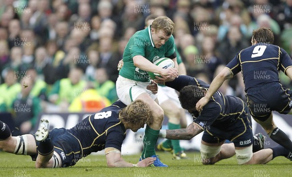 100312 - Ireland v Scotland - RBS 6 Nations -  Keith Earls of Ireland tackled by David Denton and Jim Hamilton of Scotland