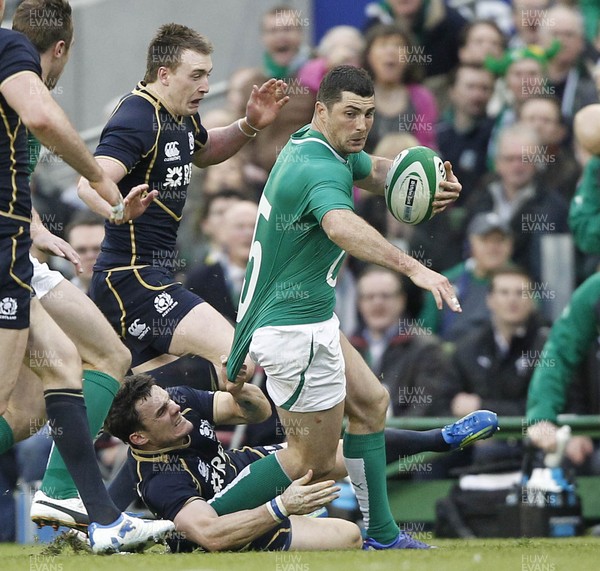 100312 - Ireland v Scotland - RBS 6 Nations -  Rob Kearney of Ireland tackled by Nick De Luca of Scotland