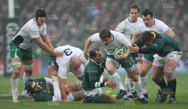 28.11.09  Ireland v South Africa... Ireland's Brian O'Driscoll finds a way through the Springbok defence. 