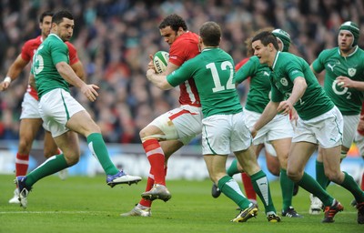 05.02.12 - Ireland v Wales - RBS Six Nations 2012 -.Jamie Roberts of Wales is tackled by Gordon D'Arcy of Ireland..