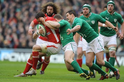 05.02.12 - Ireland v Wales - RBS Six Nations 2012 -.Jamie Roberts of Wales is tackled by Gordon D'Arcy of Ireland..