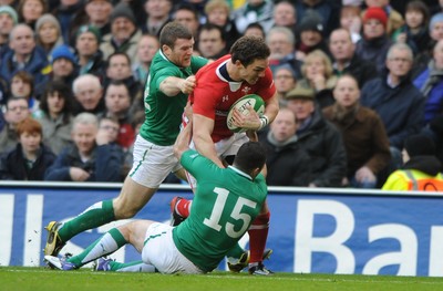 05.02.12 - Ireland v Wales - RBS Six Nations 2012 -.George North of Wales is tackled by Gordon D'Arcy and Rob Kearney of Ireland..