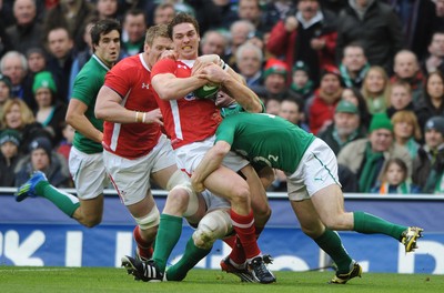 05.02.12 - Ireland v Wales - RBS Six Nations 2012 -.George North of Wales is tackled by Gordon D'Arcy and Paul O'Connell of Ireland..