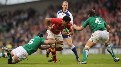 05.02.12 - Ireland v Wales - RBS Six Nations 2012 -.Toby Faletau of Wales is tackled by Stephen Ferris and Donnacha O'Callaghan of Ireland..